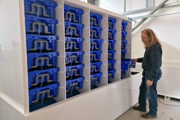 Dr Keith Todd with a Lobster Pod shellfish holding system