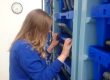 Errin Todd checking lobsters in a Lobster Pod